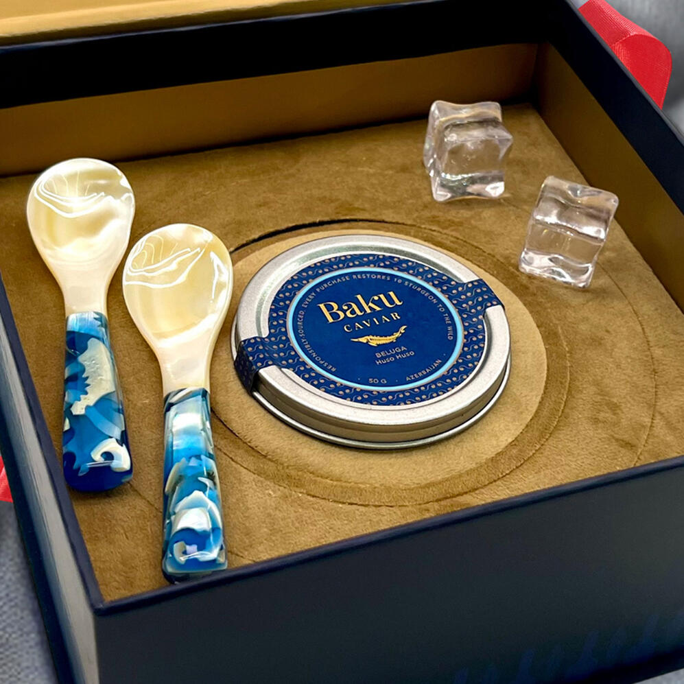 50g Baku Beluga caviar with luxe spoons, caviar opener, freeze pack, and elegant gift box. A refined tasting experience, perfectly packaged.